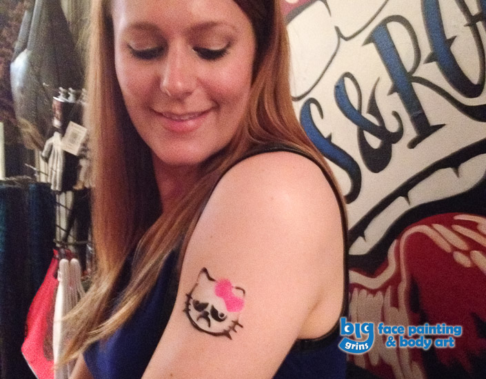 Big Grins Airbrush Temporary Tattoo cat design for a grand opening party